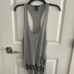 Women’s racerback loose tank top. High side cut